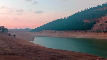 Sunset changing on a beautiful lake with mountains Aguelmam Azegza video