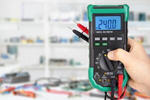 Digital Multimeter in Laboratory Setting Measuring Voltage photo