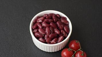Delicious nutritious canned red beans, with salt and spices as a high-calorie breakfast addition video