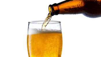 A refreshing glass of beer being poured from a bottle, creating a frothy head. png