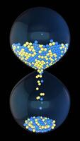 3D hourglass Falling small balls showing the passing time of hourglass close-up and isolated on glossy black background. CG animation, 4K motion graphic video