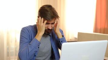 business man student feel stressed, look at computer screen worried of problem read bad online news or receive failed exam results concept sit at home office table video