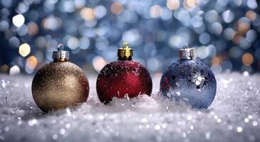 Sparkling christmas ornaments in snow photo