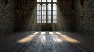 Sunlight streaming through gothic windows in an old stone building photo