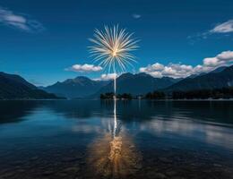 Stunning fireworks display over a serene lake with mountain backdrop photo