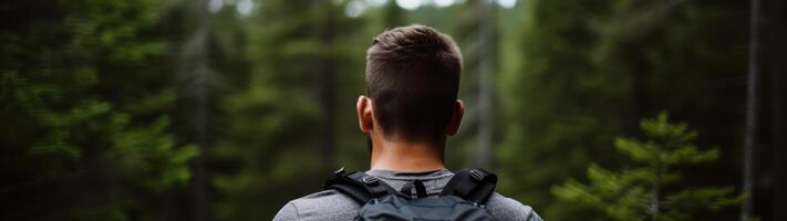 hiker exploring lush green forest photo