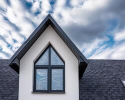 modern architectural design with triangular roof and windows photo