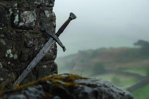 ancient sword embedded in rocky cliff face photo