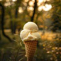 Delicious vanilla ice cream in a waffle cone photo