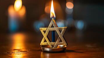Glowing Hanukkah candles in the dark photo