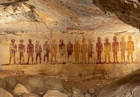 ancient cave paintings of human figures photo