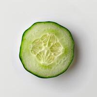 Fresh green cucumber slice on white background photo