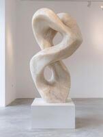 Smooth abstract sculpture with flowing curves photo