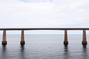 Bridge over the bay with ocean view photo