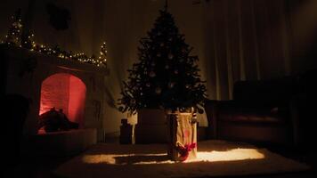 The First Christmas Gift Box For Children On Carpet In Front Of The Unlit Tree video