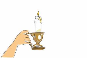 Single one line drawing hand holding candlestick with a lit candle. Share light and warmth. The only source of light in the darkness. World Candle Day. Continuous line design graphic illustration vector