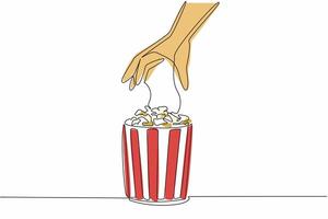 Happy National Popcorn Day. Single continuous line drawing of person hand picking caramel flavor popcorn up from stripped pop corn paper bucket. Food snack concept. One line draw illustration vector