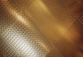 Amber-Tinted Wooden Flooring with Carbon Mesh and Metallic Accents photo