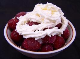 Ice Cream Sundae with Berries on Tableware photo