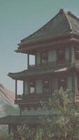 A red gate in front of a row of buildings video