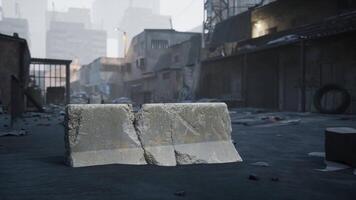 Abandoned urban street with rubble and concrete barriers in a desolate setting video