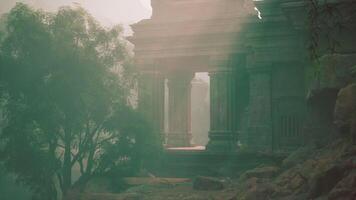Foggy View of an Ancient Cambodian Temple With Trees video