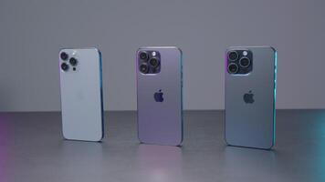 New York - September 15, 2023. Comparison of design of new iPhone models. Action. New model of iPhone 15 pro max in comparison with version of 14th and 13th generations. Comparison of design of new video