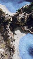 aerial view from flying drone of rocky island in Atlantic ocean video