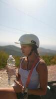 An Adventurous Climber Enjoys Hydrating While Surrounded by Beautiful Nature Scenery video