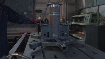 Prefabricated steel structure in factory workshop. Creative. Welded steel construction for plant. Flask with metal construction for factory machine video