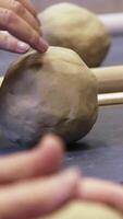 In this engaging workshop, hands skillfully shape clay during an insightful pottery craft session. Stock Clip video