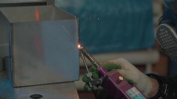 Steel welding, technician working on metal with welding machine in factory while wearing safety equipment. Creative. Construction maintenance service by manual skill labor concept. video