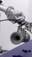 Advanced Robotic Arm Utilized in a Modern Manufacturing Environment with Enhanced Capabilities. Media video