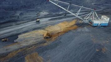 This is an Aerial View showcasing extensive Mining Operations taking place in a Quarry. Stock Clip video