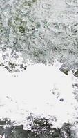 Splashing Water on a Calm and Serene Lake Surface, Creating Beautiful Ripples and Sparkles. Stock Clip video