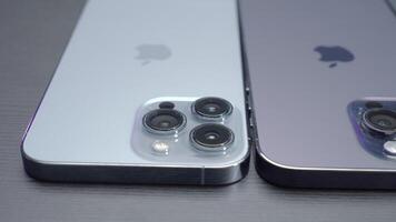 UK, London - September 15, 2023. Comparison of design of iPhone pro cameras. Action. Commercial for comparing and selling models of different generations of iPhones. Comparison of 13, 14 and 15 video