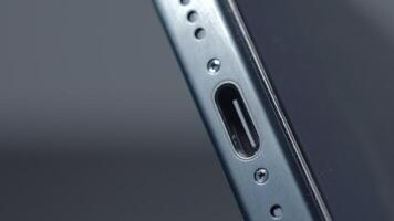 New York - September 15, 2023. Close-up of USB-C connector on iPhone. Action. Innovation in new iPhone 15 pro model with type C charging connector. New connector for iPhone 15 pro with stylish design video