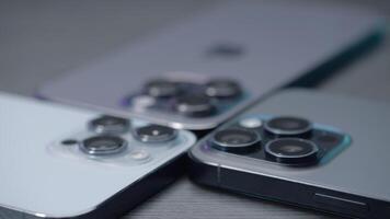 UK, London - September 15, 2023. Comparison of design of iPhone pro cameras. Action. Commercial for comparing and selling models of different generations of iPhones. Comparison of 13, 14 and 15 video