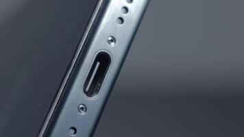 New York - September 15, 2023. Close-up of USB-C connector on iPhone. Action. Innovation in new iPhone 15 pro model with type C charging connector. New connector for iPhone 15 pro with stylish design video