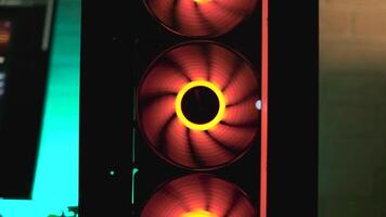 Close up of modern system unit of a computer with cooling fan and led lights. Clip. Professional equipment details. video