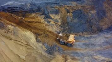 An Aerial View Showcasing a Mining Truck Operating in a Quarry During Earth Moving Activities. Stock Clip video