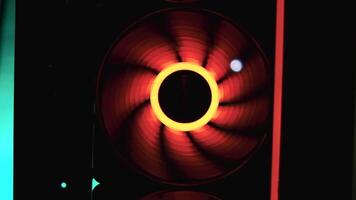 An integral part of a computer, a spinning fan. Close up of cooling system of a modern computer. video