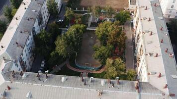 Aerial view of the new modern sleeping area with courtyards. Stock footage. Old houses in a quarter with developed infrastructure. video
