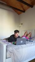 Enjoying Relaxed WorkfromHome Vibes with a Laptop While Comfortably Laid in Bed video
