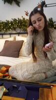 A Joyful Woman in a Festive Setting, Dressed in a Cozy Attire, Surrounded by Loved Ones video