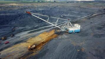 An Aerial View Displaying a Mining Operation Alongside Various Heavy Machinery Equipment. Stock Clip video