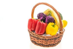 A basket with a variety of vegetables in it photo