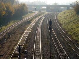 Sky and Railway Track with Trees and Electricity Lines photo