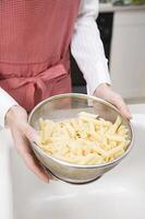Person Draining Pasta, Background, Close View Background, Food Photography photo