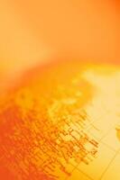 World Map in Warm Light Background photo